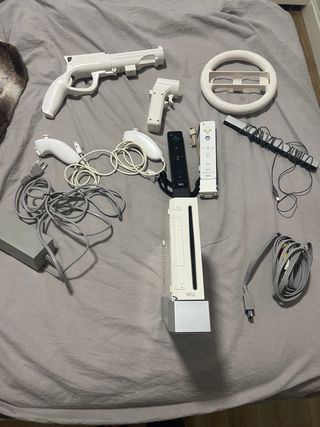 Consola Wii con mandos, accesorios y juego