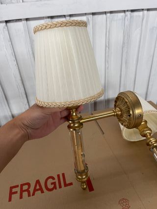 Apliques de pared dorados con cristal