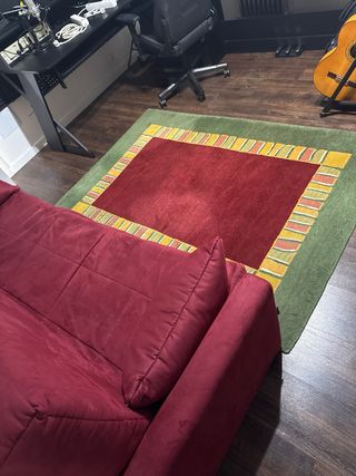 Sofá cama y alfombra a juego