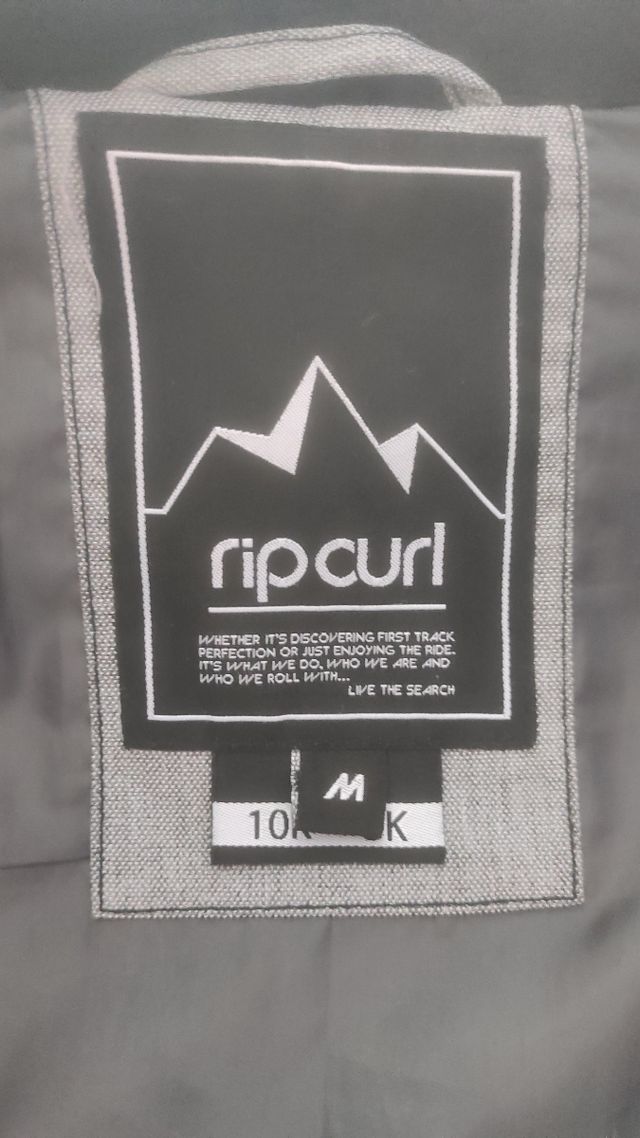 Chaqueta Rip Curl chica gris y rosa