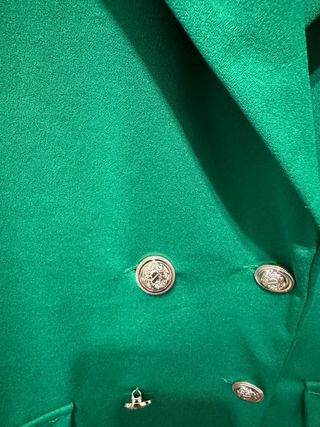 Tailleur verde giacca smanicata e pantaloni