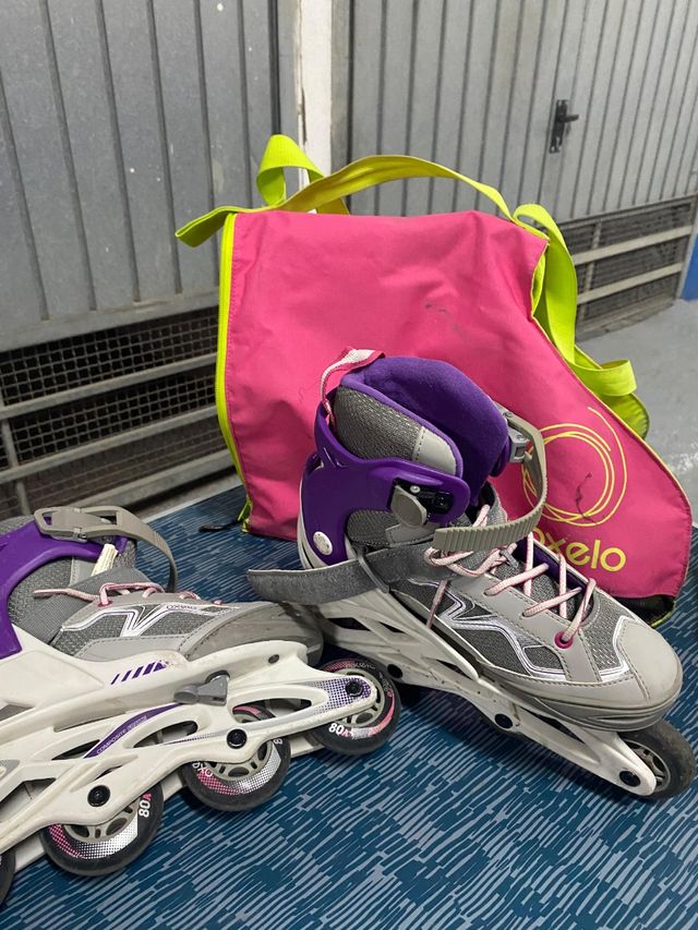 Patines en línea morados y blancos del 35