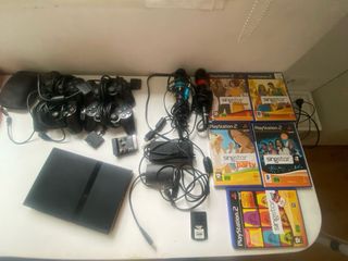 Consola PlayStation 2 con 4 mandos y juegos