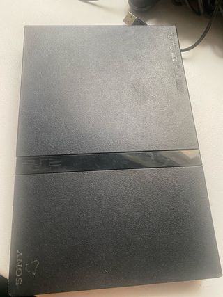 Consola PlayStation 2 con 4 mandos y juegos