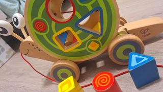 Caracol de arrastre Hape de madera