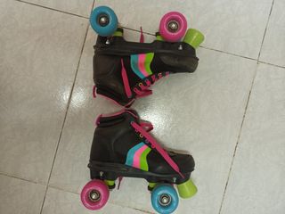Patines de ruedas en paralelo niña rosa y negro