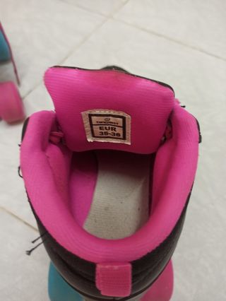 Patines de ruedas en paralelo niña rosa y negro