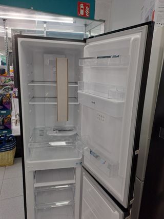 Nevera negra con dispensador de agua con garantía 