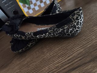 Bailarinas leopardo con lazo negro