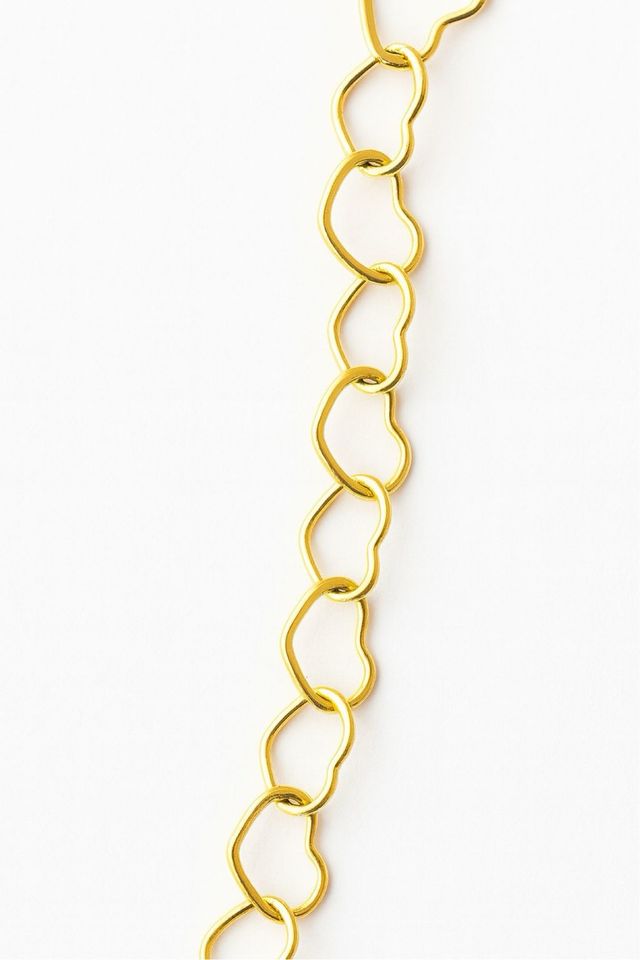 Pulsera de oro con corazones