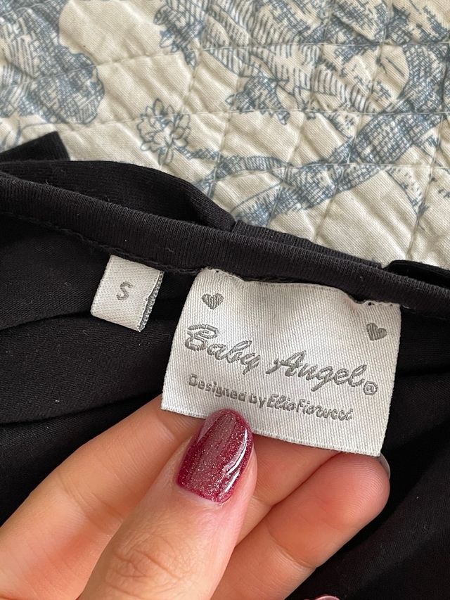 Maglia nera maniche lunghe con fiocco