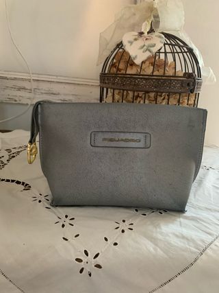 Pochette Piquadro grigio e oro