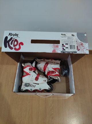 Patines en línea blancos y rojos. Talla:29-32