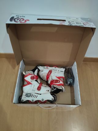 Patines en línea blancos y rojos. Talla:29-32