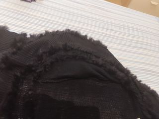 Chaqueta negra de lana y pelo de conejo auténtico.