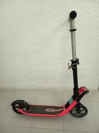 Patinete Oxelo rosa y turquesa