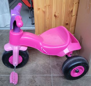 Triciclo infantil rosa con unicornio