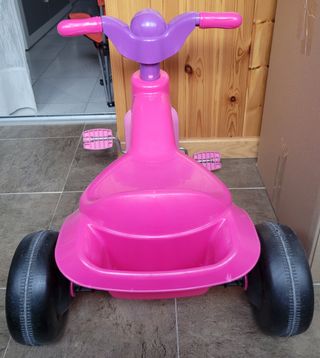 Triciclo infantil rosa con unicornio