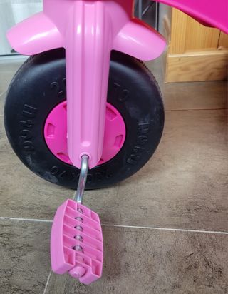 Triciclo infantil rosa con unicornio