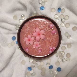Tarro con vela de flor de cerezo