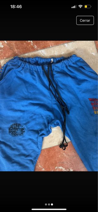 Pantalón chándal azul con logo