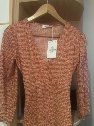 Vestido naranja y rosa