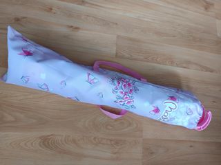 Carrito de muñecas rosa con bolsa