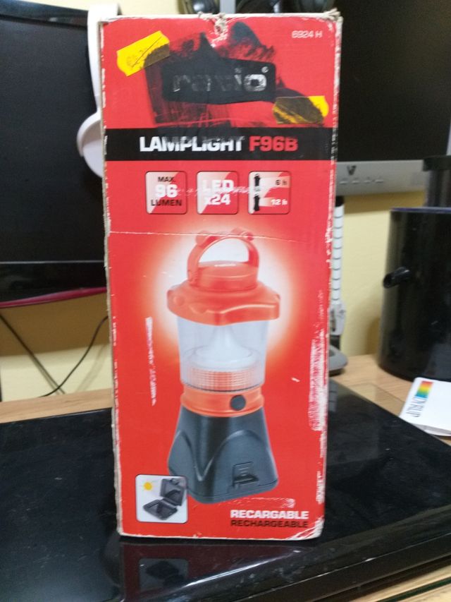 Lámpara de camping solar naranja y negra