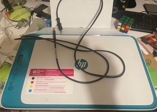 Impresora HP Azul y Blanca