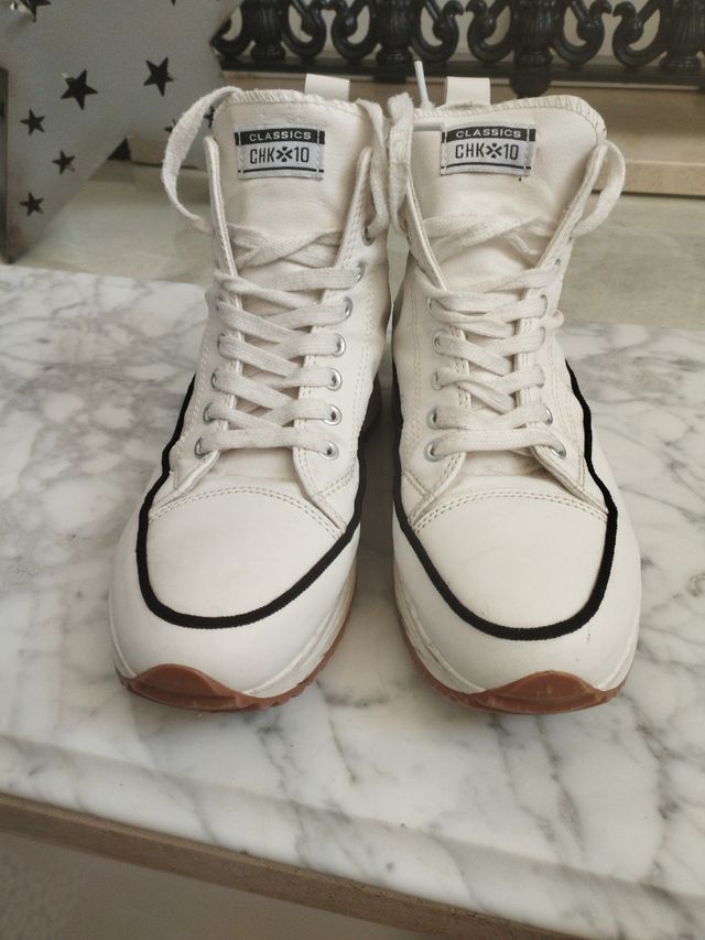 Zapatillas altas blancas.estN nuevas