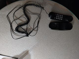 Teléfono fijo Alcatel plateado y negro