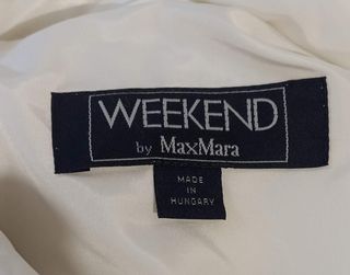 Piumino Max Mara bianco veste come una taglia 42.