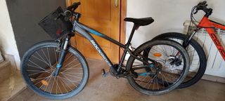 Bicicleta Rockrider con cesta