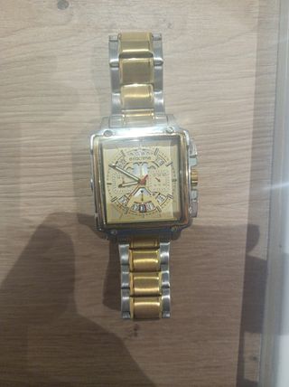 Reloj  Dorado y Plateado