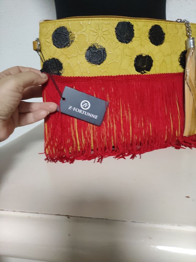 Cartera de mano mostaza con lunares