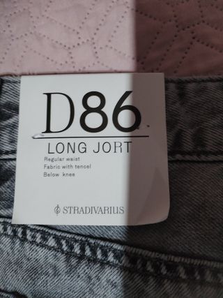 Vaqueros cortos grises desgastados