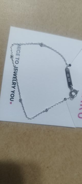 Pulsera plata ley, Baño rodio bebé