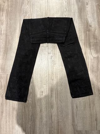 Pantalón Zara negro con rotos Talla XS
