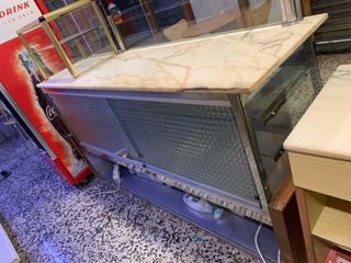 Mostrador de despacho madera y cristal