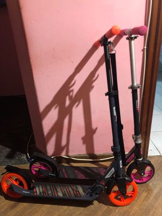 Patinetes Oxelo rosa y naranja