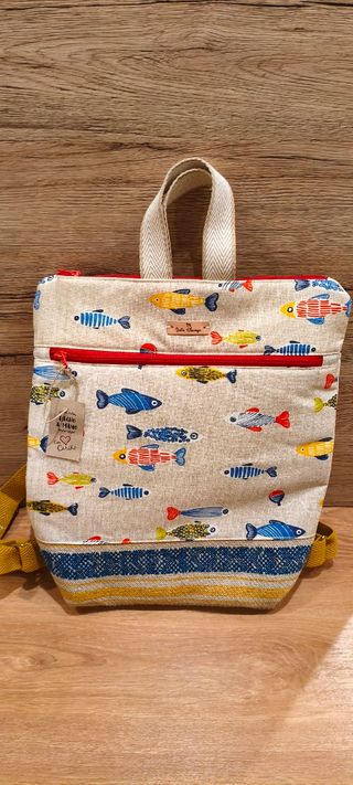 Mochila original peces amplia nueva