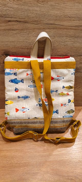 Mochila original peces amplia nueva
