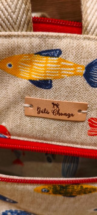 Mochila original peces amplia nueva