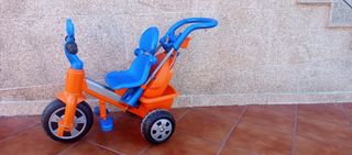 Triciclo infantil naranja y azul