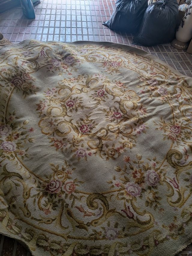 Alfombra redonda beige y rosa