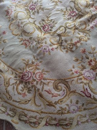 Alfombra redonda beige y rosa