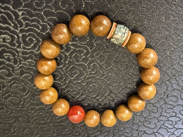 Pulsera Budista Ritualizada – Pera Silvestre