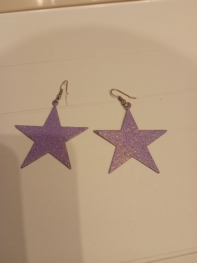 Orecchini a stella viola glitterati