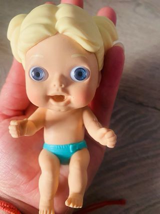 Muñeco bebé blandito con biberón Rosa