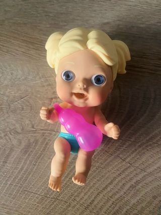 Muñeco bebé blandito con biberón Rosa